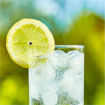 glass of water with a lemon slice